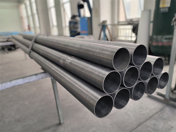 Hollow seamless titanium tube