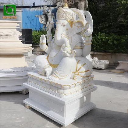 White Marble Ganesha Statue with Golden Accents