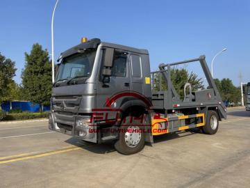 Howo lewati truk loader truk ayun lengan truk sampah