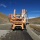 Highway guardrail piling machine