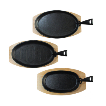 Oval Cast Iron Sizzling Pan: A Versatile Fry Dish and Serving Solution with Wooden Base