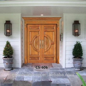 Indian house exterior arched double entry wood doors
