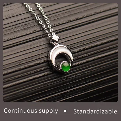 Sun and moon jade pendant