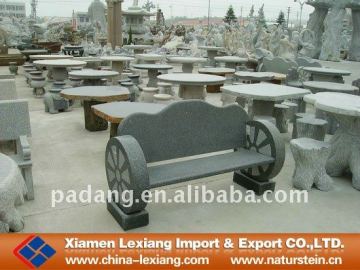 Dark wheel stone bench