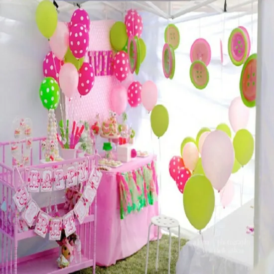 Pink birthday event decoration with colorful paper crafts
