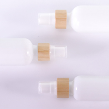 White glass bottle with bamboo mist sprayers