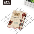 Benutzerdefinierte nostalgische PU -Leder -Notizbuch im Poststempel im Poststempel mit elastischen Gurt Hardcover -Tagebuch