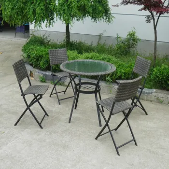 Fashionable Outdoor Dining: Glass Table and Rattan Chairs for Patio and Garden