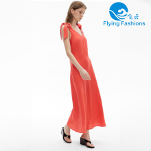 Elegante falda adornada con cinta naranja