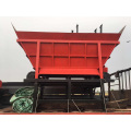 Intermediate buffer silo for the building materials industry