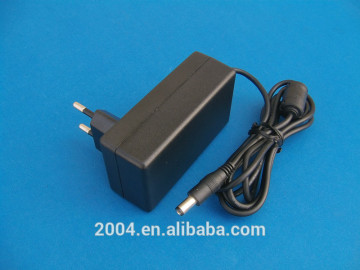 9V/12V world wide input volt UK,UL,SAA wall plug adapter with 2 years warranty