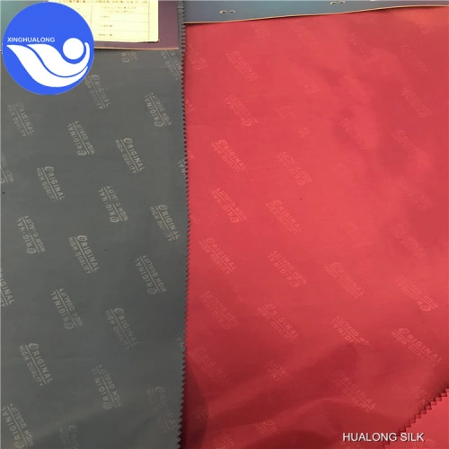 Source fabric taffeta lining custom logo emboss lining fabric 100