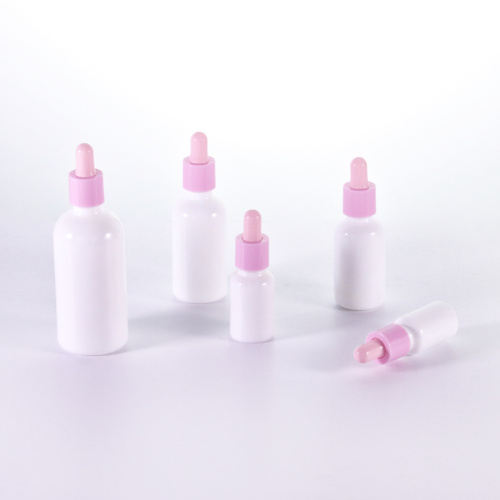 Opal white essential oil bottle with pink dropper