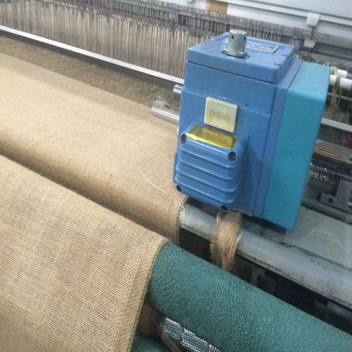 Jute weaving machine rapier loom with tucking device