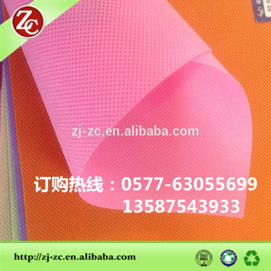 pink color pp spunbonded non woven fabric in roll for home textile