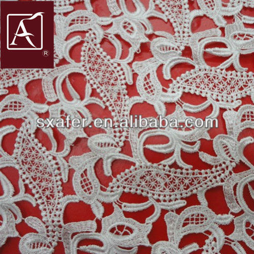 Water soluble embroidery fabric design