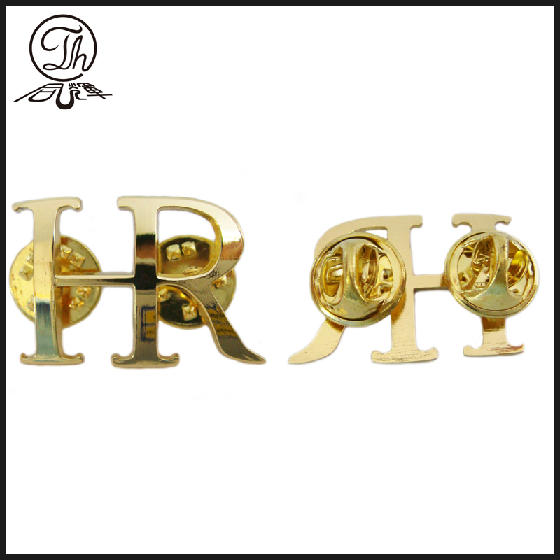 gold letter badge