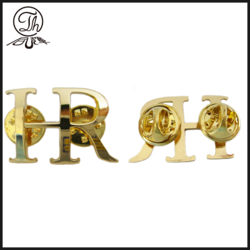 Gold metal letter shape pin badge