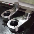 Machining of eccentric gear swing shaft