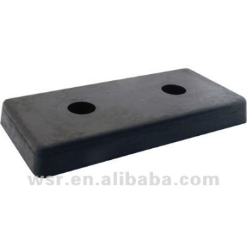 Molded rubber bumpers for home appliance