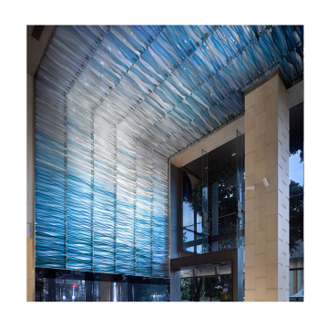 Indoor Corridor with Blue Glass Wall-Mounted Chandelier