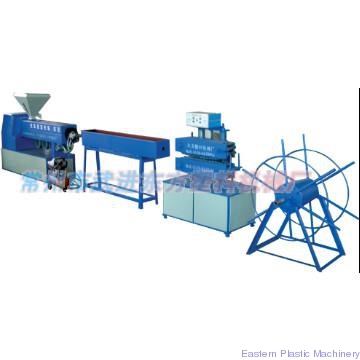 Plastic tube drawing machine