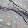 Tessuto a rete in poliestere a pois iridescente