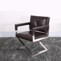 Modern X leg stainless steel armchair