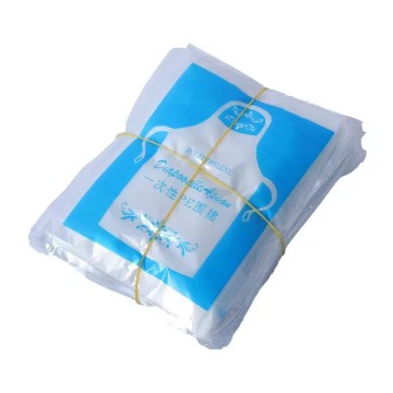 Barbiere biodegradabili e biodegradabili e grembiuli in plastica usa e getta: protezione sostenibile per professionisti