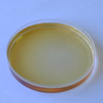 Concentrated liquid form alkaline pectinase for bioscouring