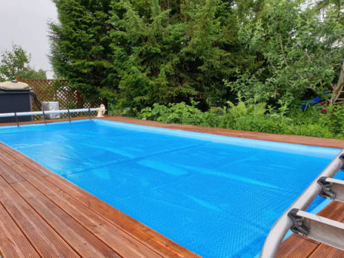 Weatherproof swimming pool tarp