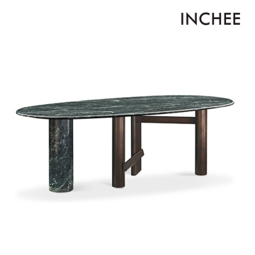 Mesa de comedor ovalado de mármol verde con pies de madera