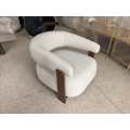 Chaise lounge minimalista de madera maciza con sofá de tela