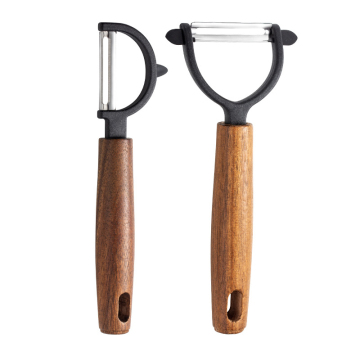 Peeler en acier inoxydable avec poignée en bois massif