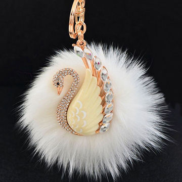 Swan-shaped white fur ball designer wholesale plush keychains, OEM/ODM orders are welcome