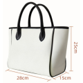 Luxury canvas and sufiber handbag