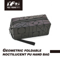 Borsa per il trucco in pelle PU luminosa dal design geometrico