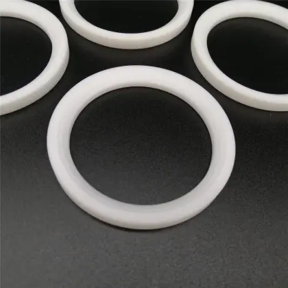 Filled PTFE enhanced low friction ball valve seat
