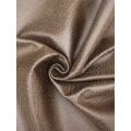 Tissu technologique d'apparence cuir à texture pierre