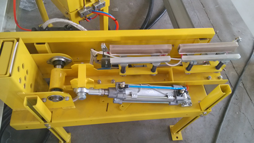 Rotary arm wrapper Top sheet dispenser packaging line