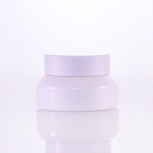 White cream jar with white plastic cap