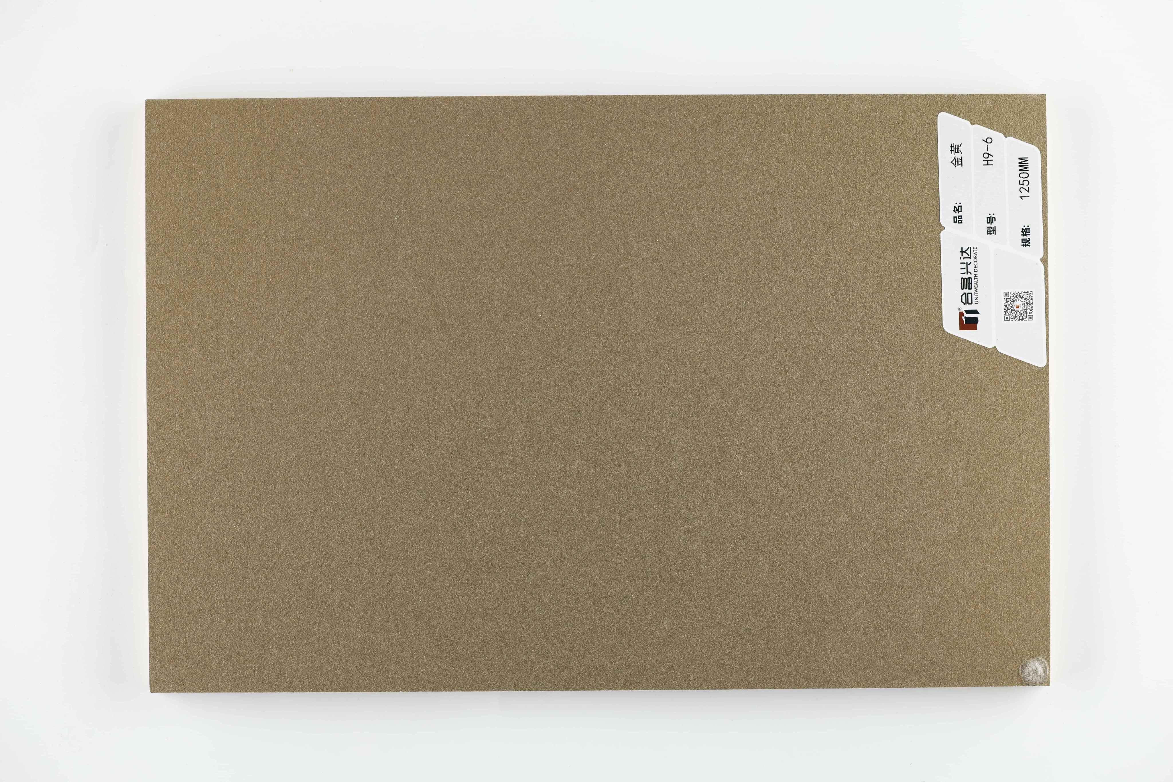 ภาพระยะใกล้ของกระดาษสีทึบพื้นผิวด้านสีทอง H9-6