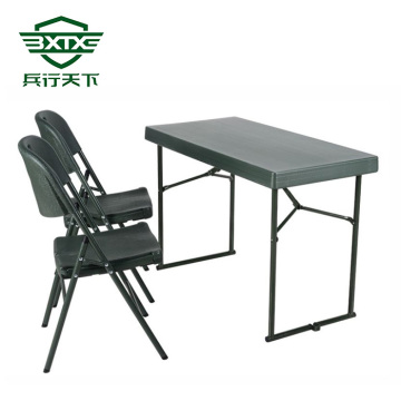 Green foldable tables and chairs