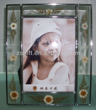 amazing glass photo frame with decorative flower and metal lipping