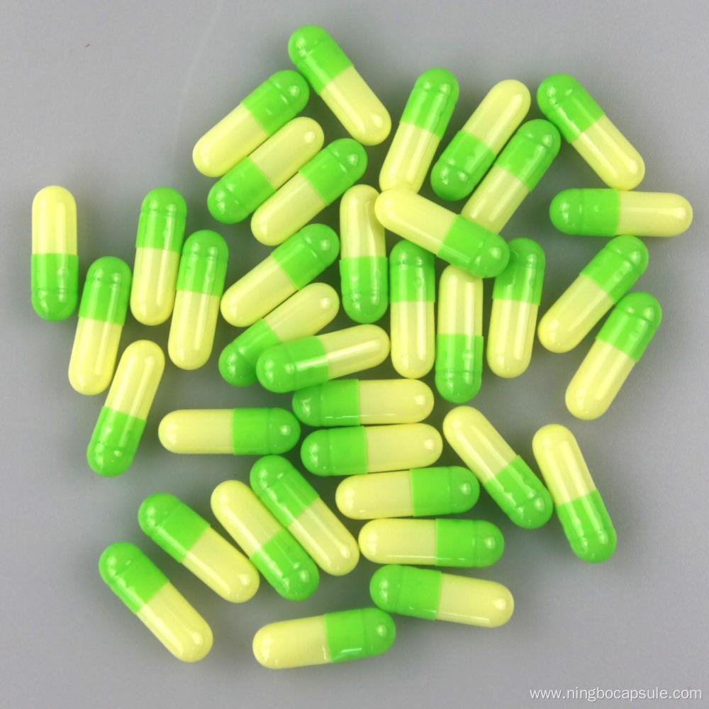 Size 00 yellow and green capsules