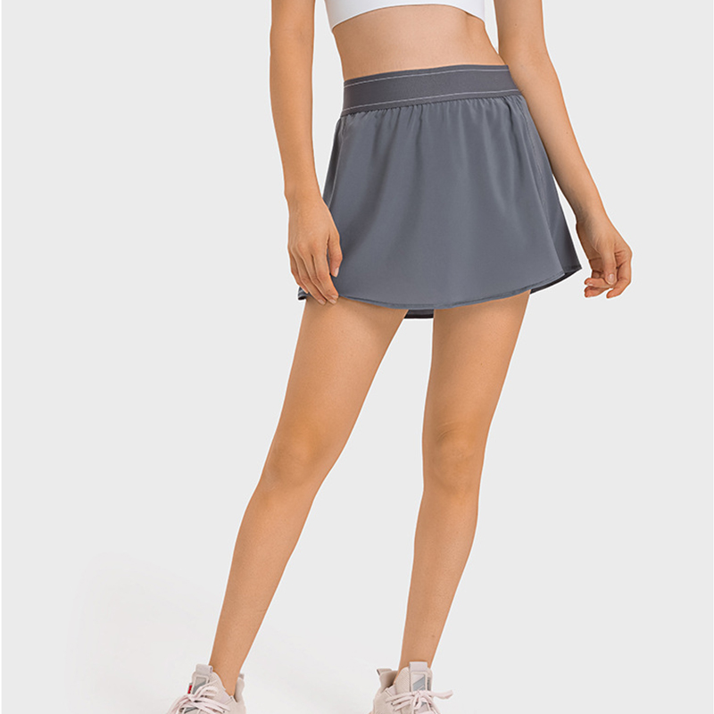 Vattenkyld tjej golf shorts kjol