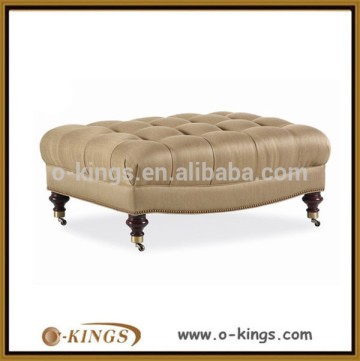 beige leather ottoman