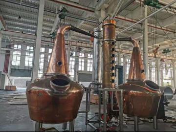 Traditional double copper pot column stills