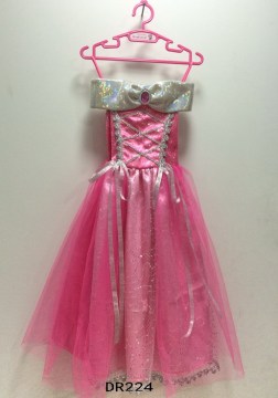 Pink ankle-length dress with ribbons.