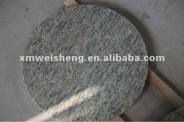 santa cecilia light raound granite table top